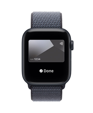Apple Watch SE 3, aluminiumboett i färgen midnatt, Apple Pay i appen Plånbok, höger utsida, Digital Crown, sportloop i ankarblått