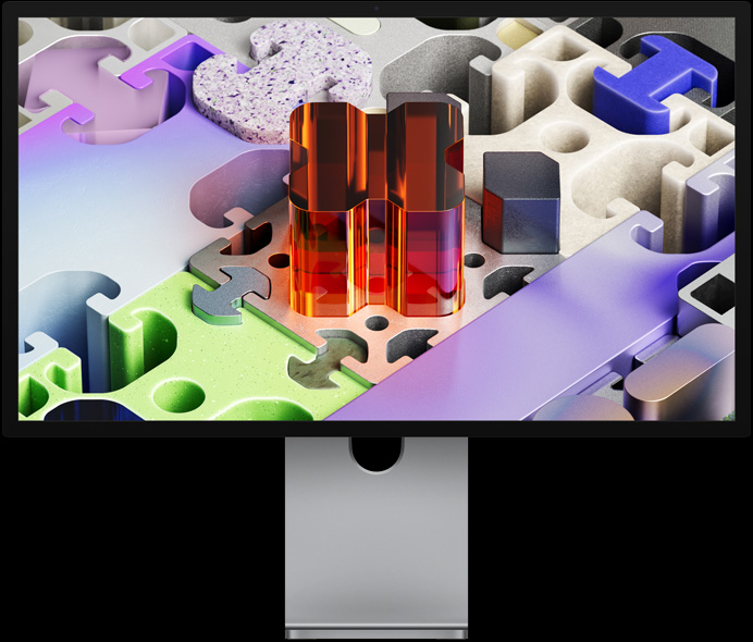 Studio Display XDR 正面圖，螢幕展示像拼圖的 3D 背景圖片